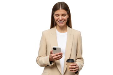 Successful woman executive manager smiling using smartphone, holding paper cup of coffee in hand reading funny comment on her last post in social media
