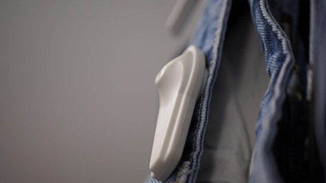 Clothing security tag on a jeans ,