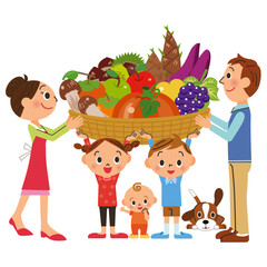 秋の食材の収穫を喜ぶ家族