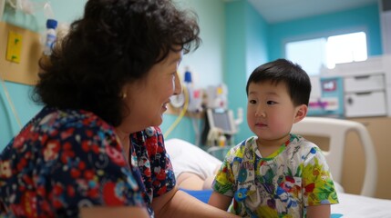 Obraz premium Asian Pediatric Hospital Staff Caring for Young Patients in Medical Setting
