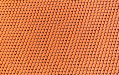 Red roof tiles of the house as an abstract background. Texture