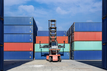 Stack of containers in a harbor. Shipping containers stacked on cargo ship. Background of Stack of...