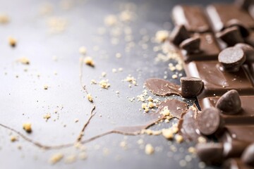 Fototapeta premium Close-up dark chocolate on a dark background