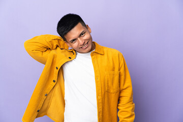 Young Ecuadorian man isolated on purple background laughing