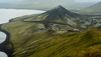Old and green Volcano with moody atmosphere near Landmannalaugar, Iceland