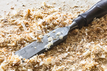 Chisel lying in wood shavings