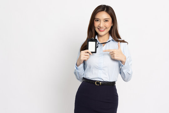 Asian female office employee showing employee card or business card isolated on white background - Powered by Adobe