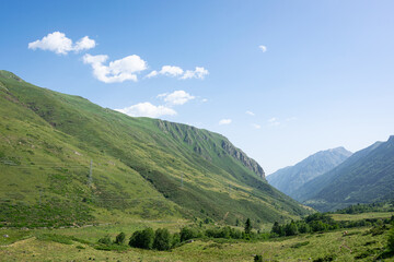 Obraz premium Beautiful barren mountains on the border of Andorra and France, seen from the Col de Puymorens at about 2000 meters altitude