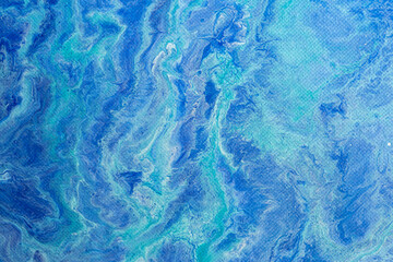  青色の絵具のマーブル模様の背景