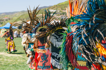 Powwow. Native Americans dressed in full regalia. Details of regalia close up. Chumash Day Powwow