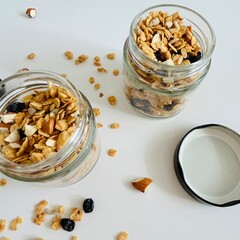 Sweet Homemade Granola in Glass Jar with Nuts