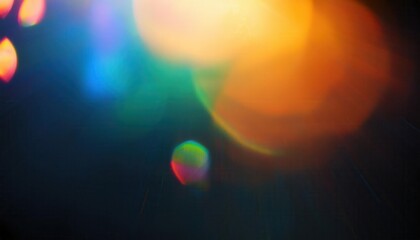 Fototapeta premium Abstract Colorful Lens Flare and Light Refractions on a Dark Background with Rainbow Bokeh Effects. Glowing Prismatic Orbs and Radiating Sunbeams in a Dreamy, Ethereal, and Vibrant Atmosphere