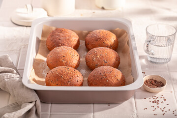 Homemade and tasty flax seed rolls baked in the bakery.