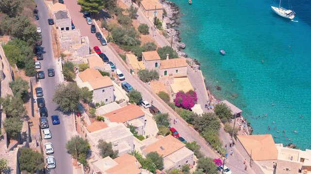 Greece Peloponnese Region Limeni Town Unique Blue Waters People Swimming in the Sea in Summer Holiday Concept and Boats