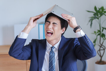 落ち込むビジネスマン
