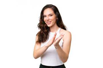 Young caucasian woman isolated over isolated background applauding after presentation in a conference