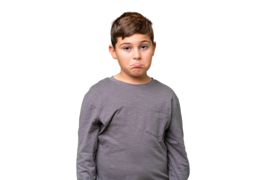Little caucasian kid over isolated chroma key background with sad expression