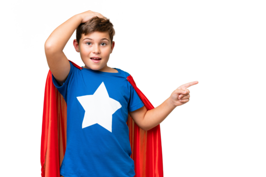 Super Hero caucasian kid over isolated chroma key background surprised and pointing finger to the side