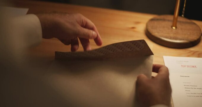 Folder with documents marked with Top Secret Stamp