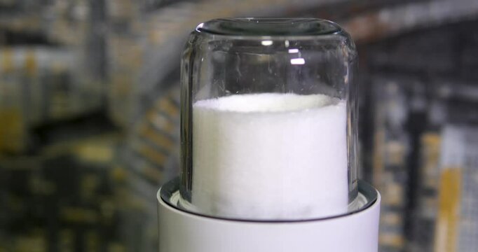grind sugar into powdered sugar powdered sugar to make from sugar with a blender. High quality 4k footage