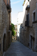 Obraz premium View of the street in the old town. Location vertical. Close-up. Gerona. Spain.