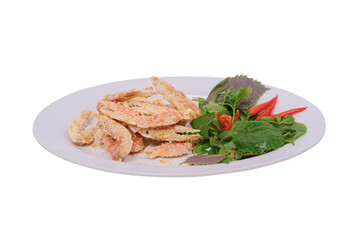 a plate of salted sentinel crab claws accompanied by fresh herbs and red chilies on a white background. The dish looks appetizing and well-presented, highlighting its gourmet appeal.