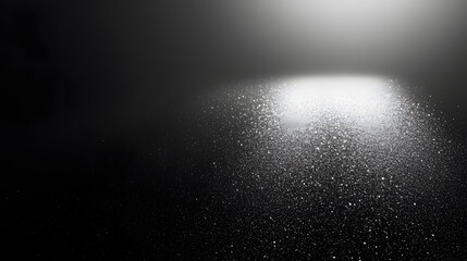 Obraz premium Abstract black white grainy gradient background with illuminated spot on dark gray noise texture with copy space