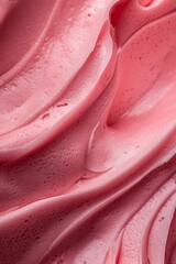  A tight shot of a pink liquid with water droplets forming on its surface