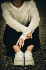 women's legs in sneakers close-up