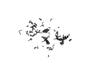 Wakame seaweed pieces isolated, edible raw algae, dry undaria pinnatifida healthy food kelp