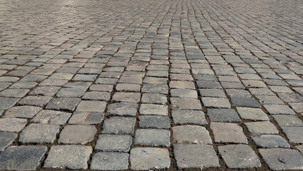 Sampietrini. Paving of ancient Roman roads. The cobblestones in Piazza del Campidoglio.
