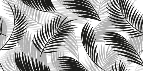 Hand drawn palm leaf silhouette seamless pattern, tropical plant themed fabric design.