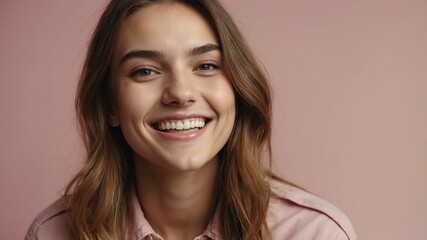 Fototapeta premium teenage caucasian woman on pastel pink background model close-up smiling with beautiful teeth for ad concept space for text