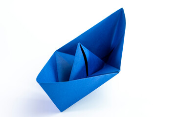 Paper colored boat isolated on white background. origami crafts. transport concept. origami.