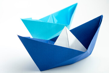 Paper colored boat isolated on white background. origami crafts. transport concept. origami.