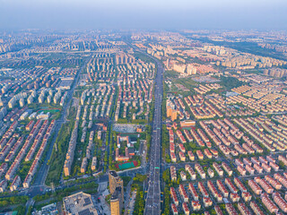 Aerial view of Shanghai Downtown skyline, highway roads or street . Financial district and business area in smart urban city. Skyscraper and high-rise buildings in sunny day