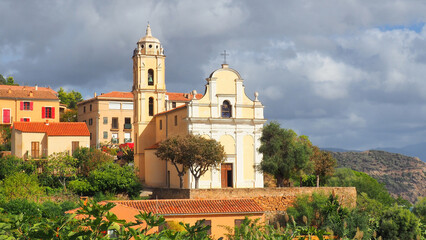 In Cargese, a small village on the west coast of Corsica, built on a promontory facing the sea and dominated by two churches, the Latin church faces the Orthodox church