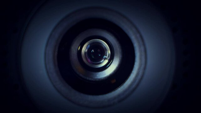 Focus pull and zoom through a surveillance camera lens