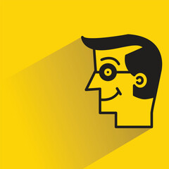 male face avatar with shadow on yellow background