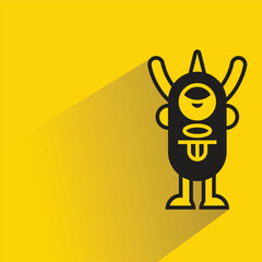 monster icon with shadow on yellow background