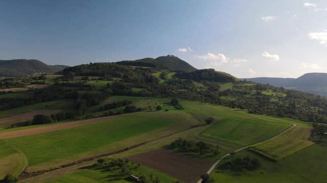 A flight above Dettingen Teck towards the Castle Teck which is located high above the mountain 