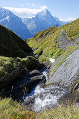 Eiger North face,Bernese Oberland,Switzerland, small river in front, vertical