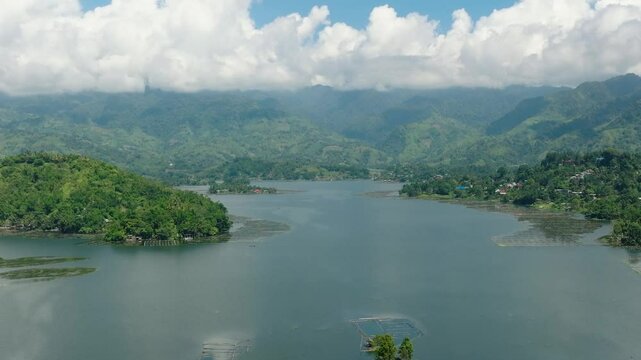 Drone survey of Lake Sebu surrounded by dry land, mountain forest. Mindanao, Philippines. Eco-Tourism destinations.