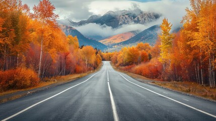 Fototapeta premium Asphalt highway road and mountain natural landscape in autumn season