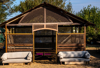 A large gazebo for relaxing in the forest.