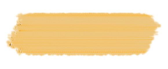 Brush stroke in a warm golden hue with a textured surface