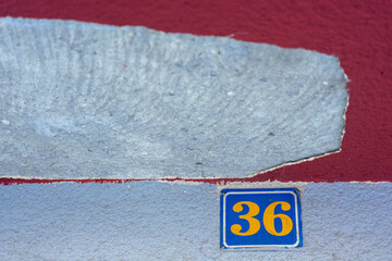 Number 36: Home Address Under Damaged Ceiling Wall