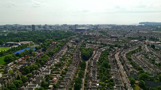 Pontcanna, the leafy terraced suburb of Cardiff with shooting location for His Dark Materials in centre and Millennium Principality Stadium in the distance, aerial shot taken on Pride weekend 2023