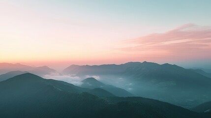 Fototapeta premium Flat lay of a peaceful mountain ridge at sunrise, with ample sky for copy space, creating a dramatic and inspiring natural scene. -