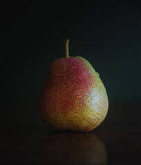 A whole blush pear in close up